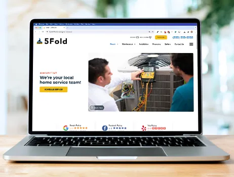 A home-service website open on a laptop